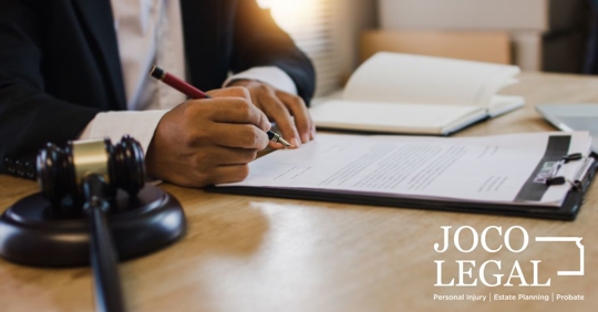 close up of a lawyer signing documents
